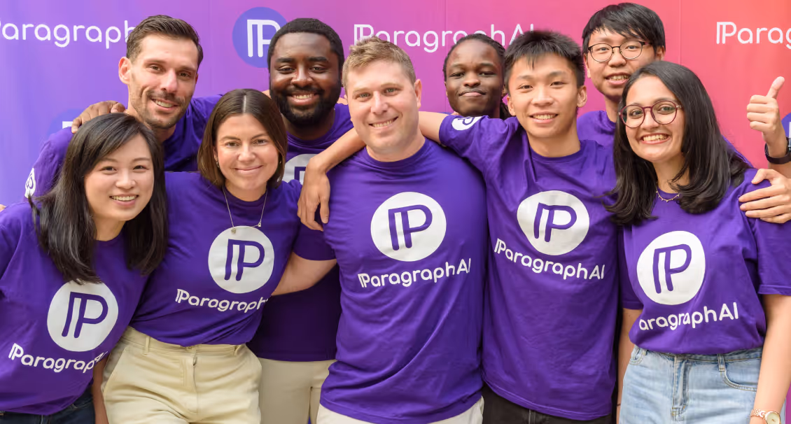 The ParagraphAI team looking at into the camera wearing PAI branded tshirts